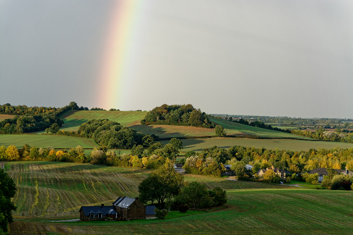 a rainbow over a small town